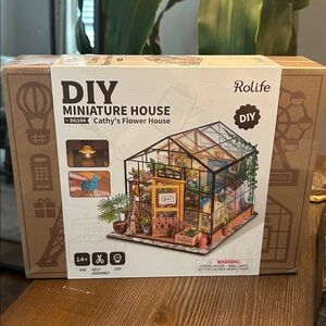 Rolife DIY Miniature House Kit.  Cathy’s Flower House 
New never opened. DG104